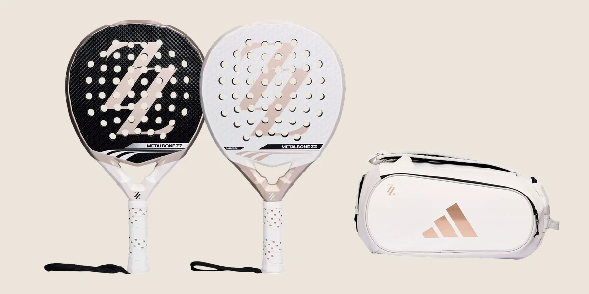 Las dos palas Metalbone ZZ de Zinedine Zidane, la Team negra y la Carbon blanca, con el logotipo ZZ en beige, junto al paletero Tour ZZ blanco